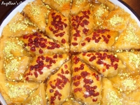 Baklava christmas star with pistachio and dried cranberries