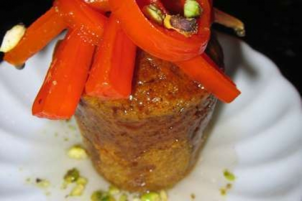 Spiced carrot baba au rhum with candied carrots and pistachio